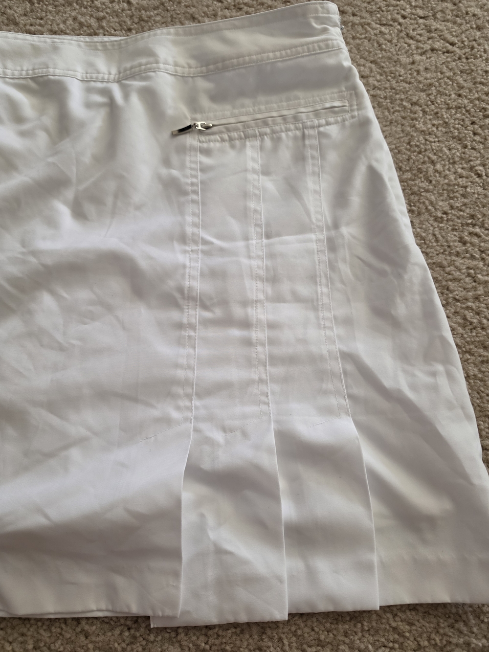 Izod White Semi Pleated Golf Skirt with Zip Pocket Detail